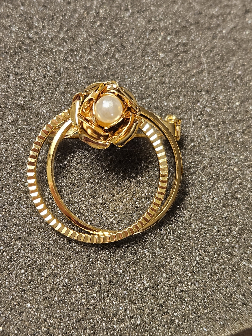 Vintage gold-tone double- circle brooch featuring a sculpted rose with Pearl